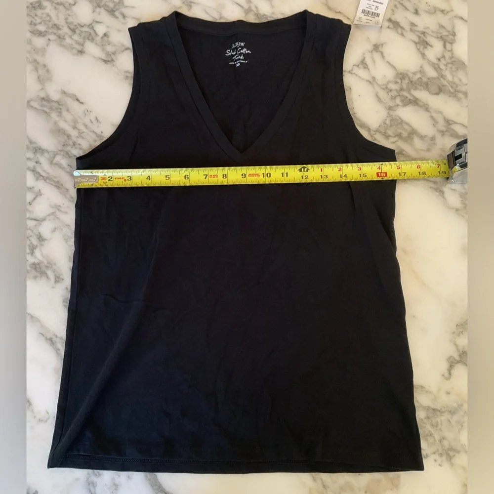 NWT J. Crew cotton slub tank Sz XS. Small Hole from sensor in back.